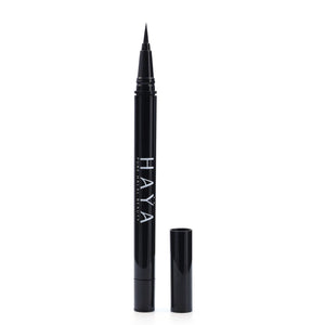A black eyeliner pen with the brand name 'HAYA' printed on the side, with its cap removed, isolated on a white background.